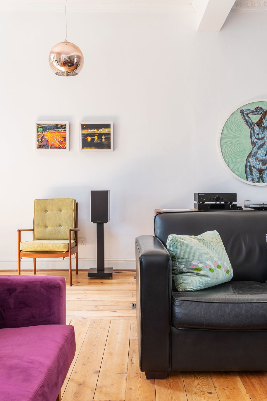 Living room with colourful artwork