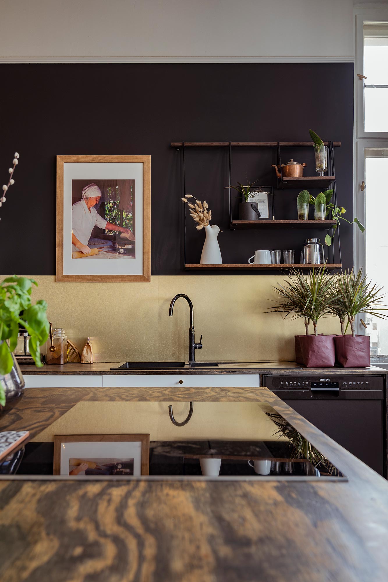 Black and gold kitchen