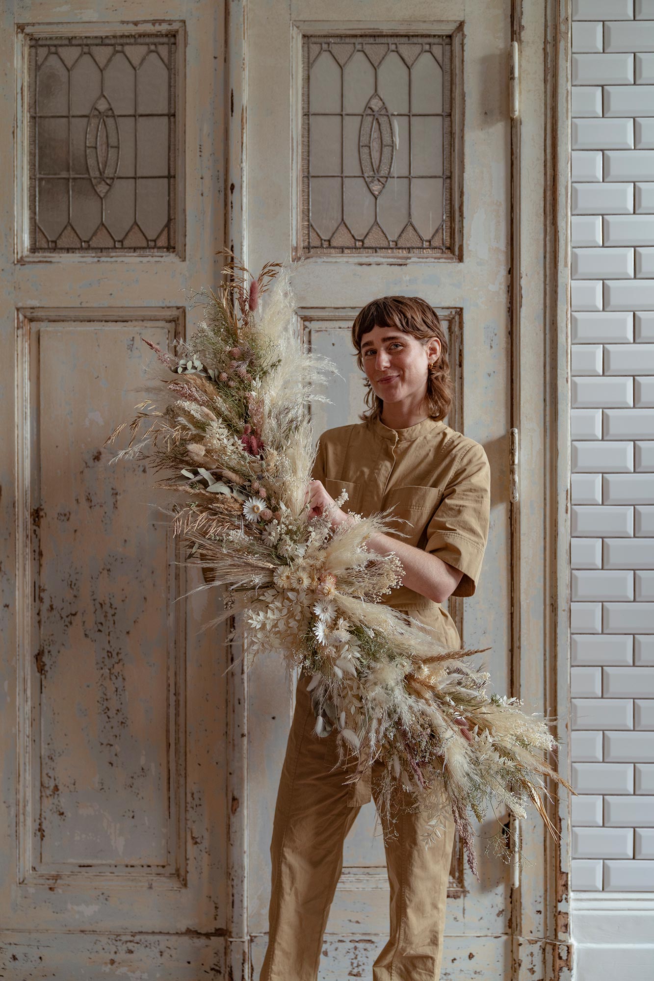 Mia Jivung with her dried flower creations