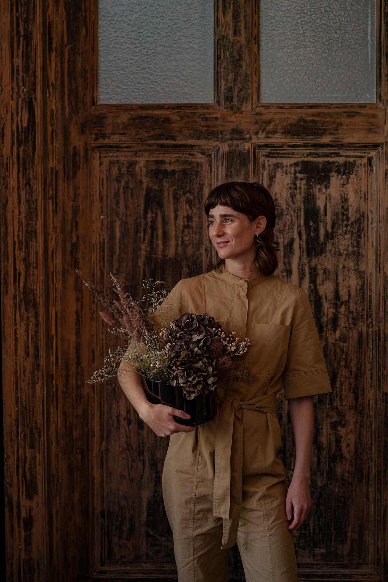 Mia Jivung with her dried flower bouquet